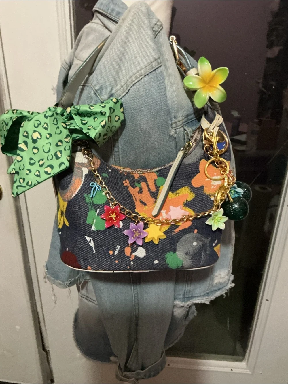 Paint-Splash Denim Shoulder Bag with Floral Charm - Green Accents